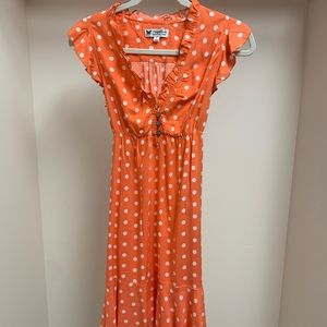 Orange dress with white polka dots!
